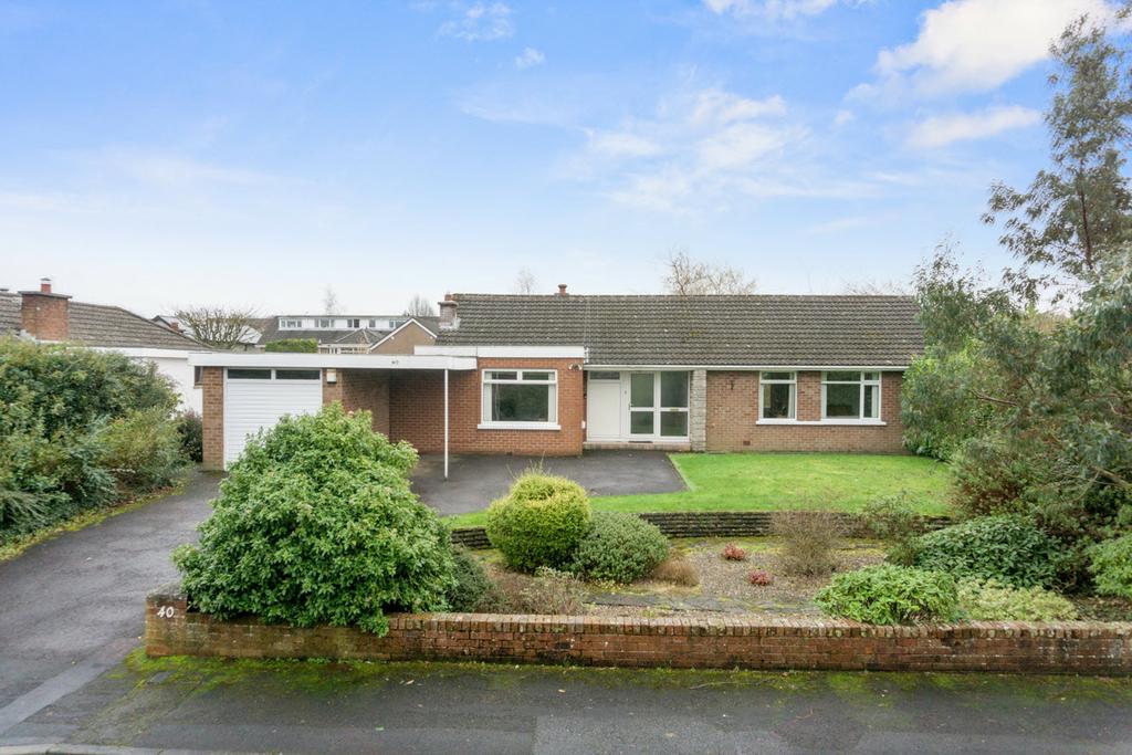 Occupying an excellent site with an open aspect to the front, this superb detached bungalow occupies a mature level site.