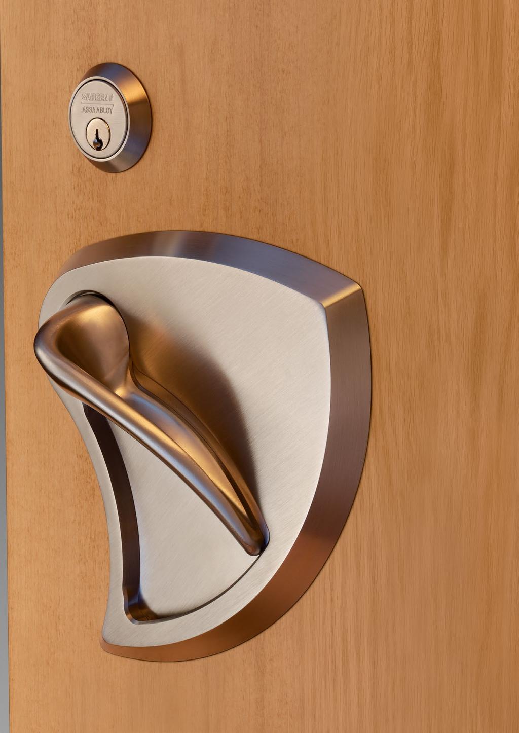 Door Hardware Integrated Low Profile Trim This innovative, low profile trim integrates the lever and escutcheon, creating a superior design that is safer, easy to use and aesthetically pleasing.
