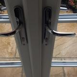 Each sash window unit including four double glazed units with two chrome latch and lock mechanisms and chrome window