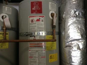 Age Water heater in excess of 12 years and has exceeded useful life span, recommend monitoring or replacement.