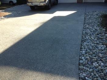 3. Driveway and Walkway Condition Concrete sidewalks and driveways appeared in good condition overall.