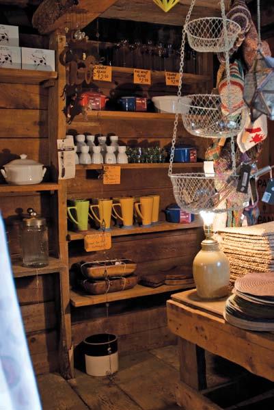 Delight in the displays on shelves built into the old rowboat found on the banks of Thessalon River and admire the many items displayed atop the old wagon bought at an auction.