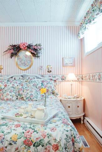 feature The Garden Manor does double duty as a garden shed and a little hangout for Maggi. TOP: There s a retro feel to the blue willow floral décor of the guest bedroom.