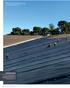 FIGURE 1 Crews finalizing 60-mil (1.5-mil), five-ply CSPE geomembrane liner with cap strips over field seams at the Palos Verdes Reservoir